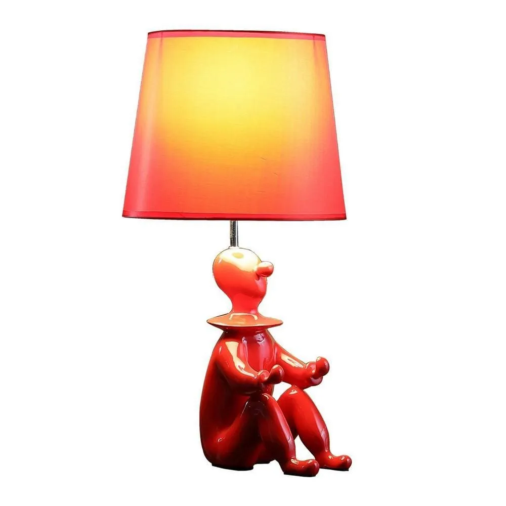 Fabric Shade Table Lamp with Polyresin Sitting Clown Base, Red By Casagear Home