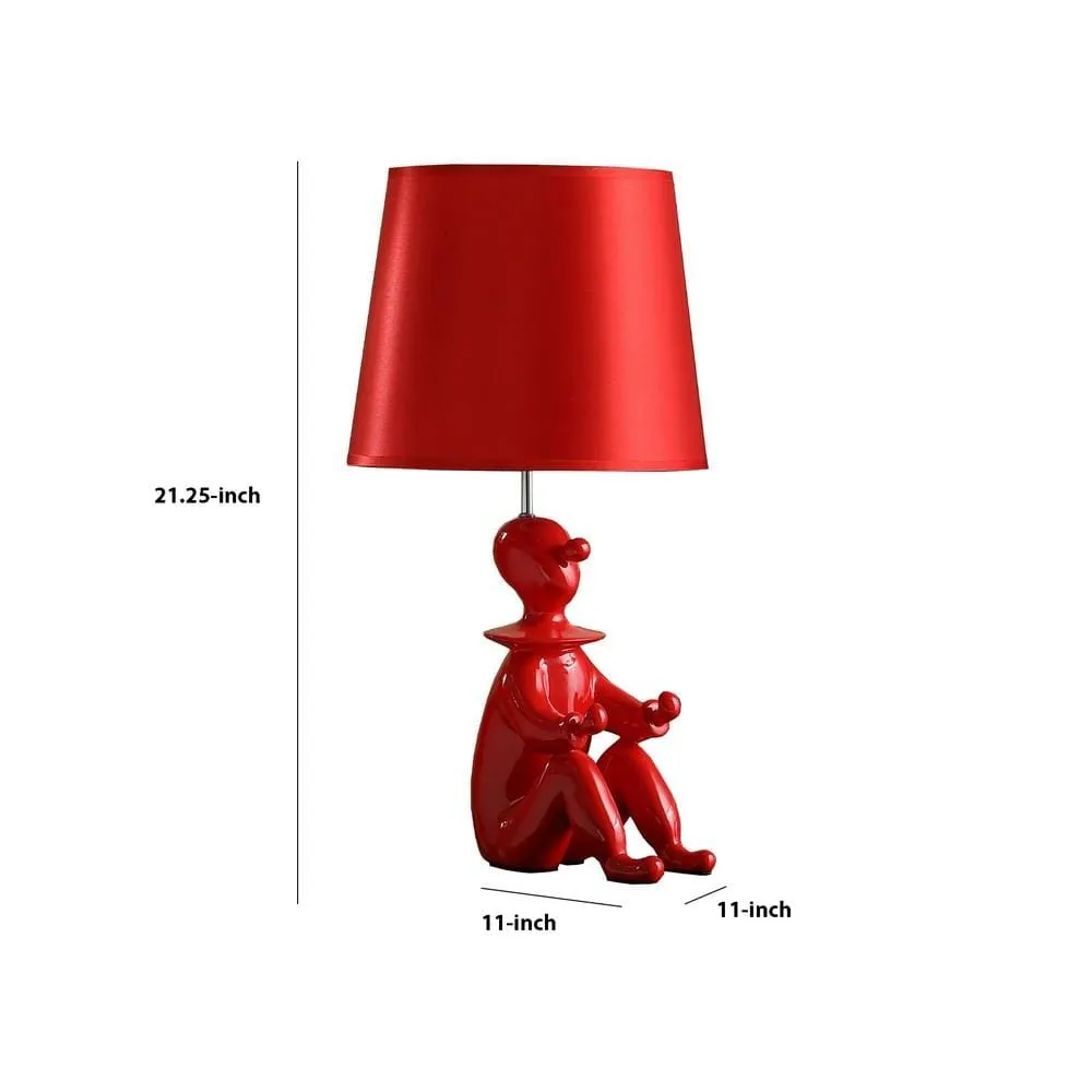 Fabric Shade Table Lamp with Polyresin Sitting Clown Base, Red By Casagear Home