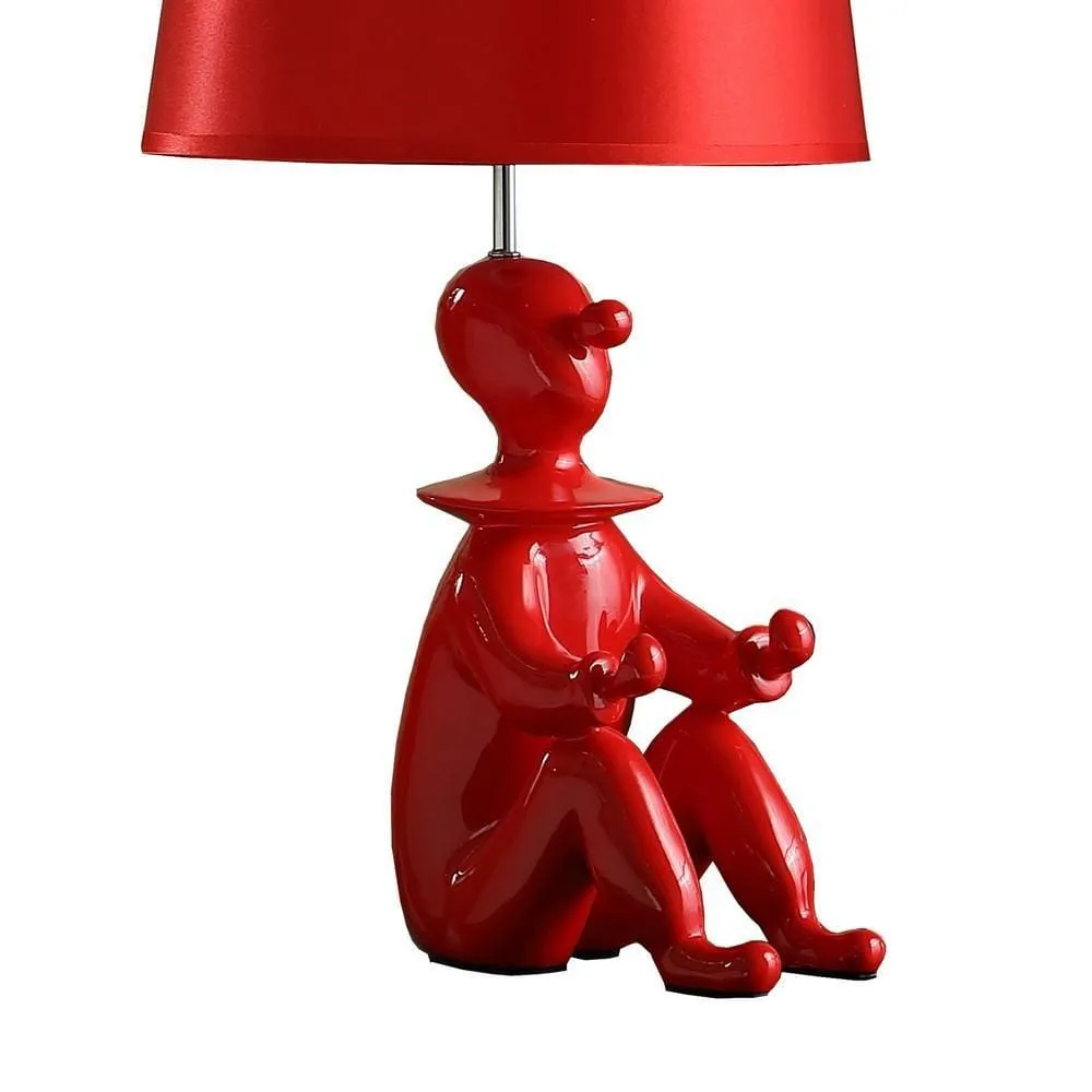 Fabric Shade Table Lamp with Polyresin Sitting Clown Base, Red By Casagear Home